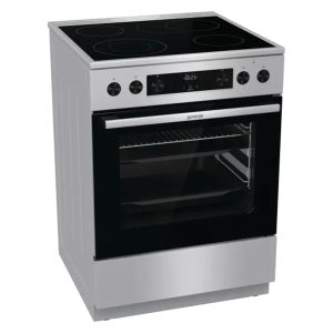 Κεραμική κουζίνα inox Gorenje GECS6C70XPA, πλάγια όψη με κλειστή πόρτα φούρνου.